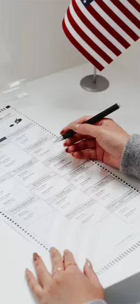 Voter filling out a ballot