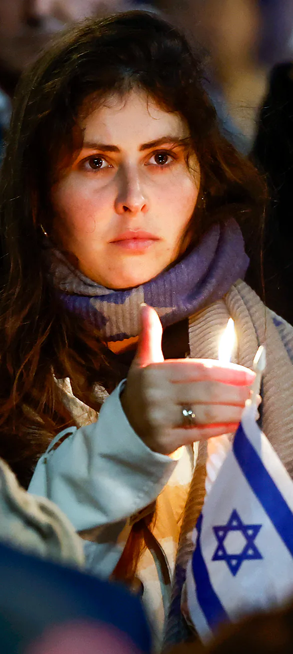 woman holding candle in Israel